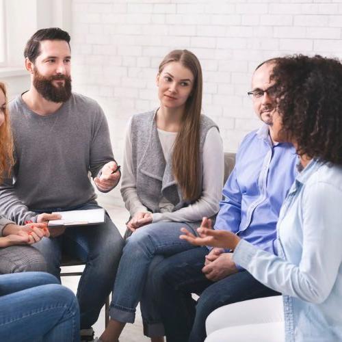 Students sitting in group therapy sessions